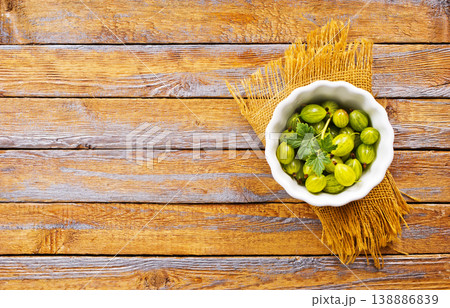 bowl with ripe berries, fresh gooseberry 138886839