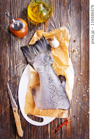 Pieces of fresh salmon on a table Pieces of fresh salmon on a table 138886876