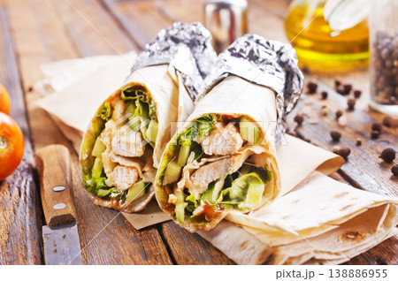 Tortilla wraps with chicken fillet and vegetables. 138886955