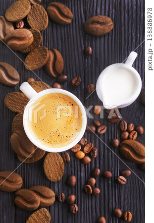 cookies and coffee cup on a table cookies and coffee cup on a table 138886978