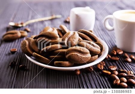 cookies and coffee cup on a table cookies and coffee cup on a table 138886983
