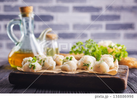 raw chicken balls on wooden board 138886998