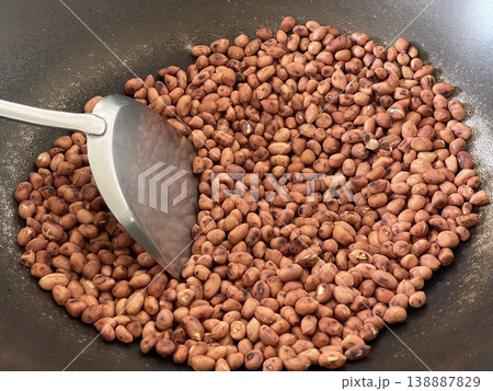 Close Up Of Roasting Peanuts In A Wok During Home Cooking Close Up Of Roasting Peanuts In A Wok During Home Cooking 138887829