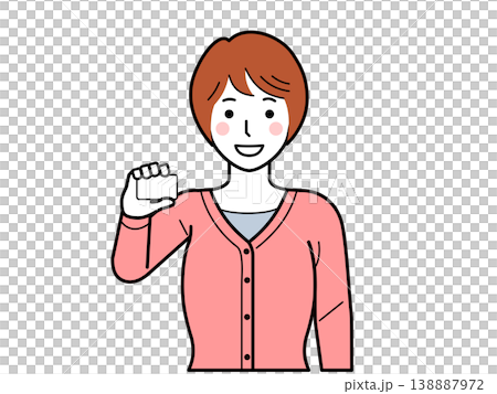 面向前方。一位身穿開襟羊毛衫的年輕女子手持一張卡片。 面向前方。一位身穿開襟羊毛衫的年輕女子手持一張卡片。 138887972
