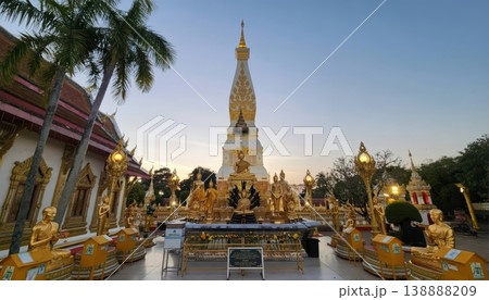 Wat Phra That Phanom Temple with Golden Buddha Statues at Sunset, Nakhon Phanom, Thailand 138888209