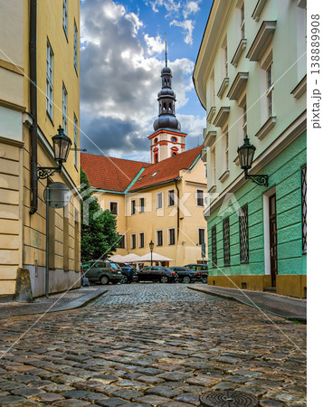 Narrow cobblestone street among and colorful buildings in Old Town of Prague. Narrow cobblestone street among and colorful buildings in Old Town of Prague. 138889908