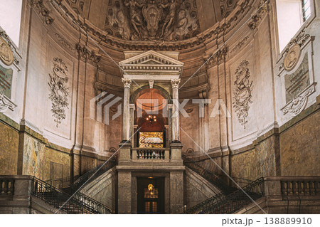 Baroque interior of Storkyrkan cathedral with ornate altar and tourists, Stockholm Baroque interior of Storkyrkan cathedral with ornate altar and tourists, Stockholm 138889910