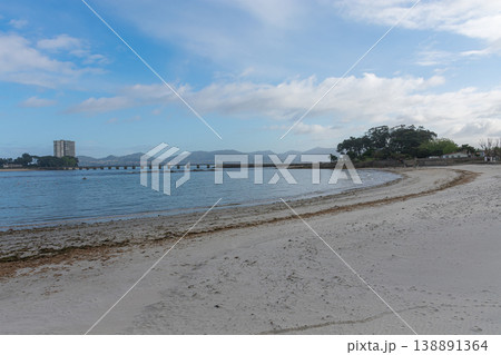 Toralla Island with its residential skyscraper and private bridge over the sea in the city of Vigo, Galicia, Spain Toralla Island with its residential skyscraper and private bridge over the sea in the city of Vigo, Galicia, Spain 138891364