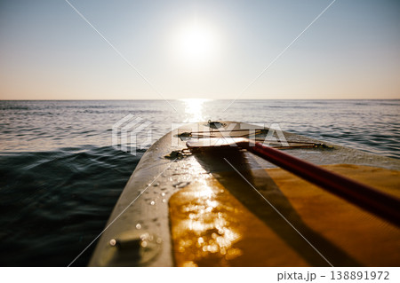 Standup paddleboarding, stand-up paddleboarding or stand up paddle SUP Standup paddleboarding, stand-up paddleboarding or stand up paddle SUP 138891972