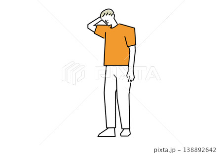 頭を掻きながら俯く青年 138892642