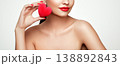 Young beautiful woman with heart shaped gift 138892843
