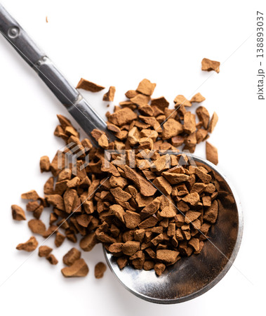 Instant coffee granules on spoon vertical minimal Instant coffee granules on spoon vertical minimal 138893037
