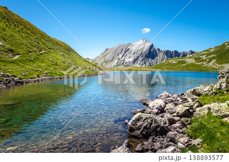 Alpine Jovet lakes with clear reflection in Les Contamines-Montjoie, France Alpine Jovet lakes with clear reflection in Les Contamines-Montjoie, France 138893577