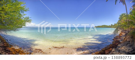 Tropical bay with shallow water and palm coastline Panama Tropical bay with shallow water and palm coastline Panama 138893772