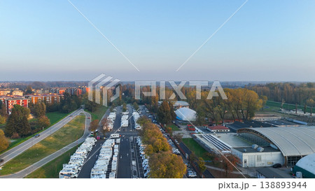 Piazzale Azzuri d'Italia in Cremona operating as a tourist camper parking facility, aerial view of RVs and motorhomes 138893944