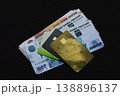 Russian rubles and plastic bank cards on a black background 138896137