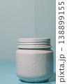 White cream jar on blue background 138899155