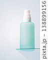 Minimal skincare pump bottle on glass shelf with copy space 138899156