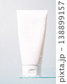White cosmetic tube on glass shelf with copy space 138899157