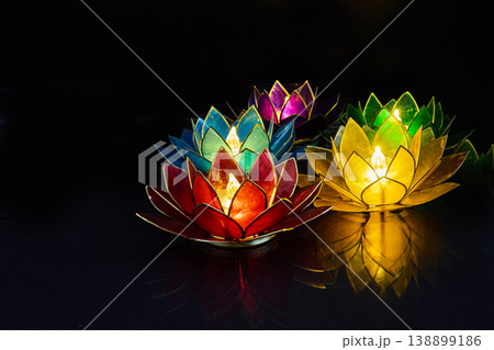 Vesak day. Colorful lotus lanterns floating, illuminating dark water at night 138899186