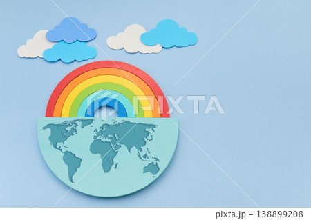 Happy Earth Day. Global environment concept with rainbow and clouds Happy Earth Day. Global environment concept with rainbow and clouds 138899208