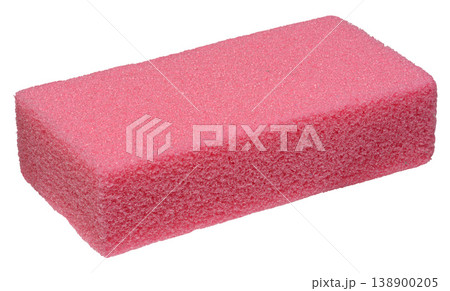 A pink rectangular pumice stone with a porous texture on an isolated background, designed for cosmetic care of the skin of the feet 138900205