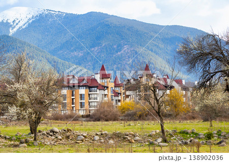 buildings in bansko, snowy pirin peaks in bulgaria buildings in bansko, snowy pirin peaks in bulgaria 138902036