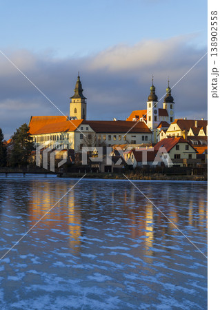 Telc town reflecting on frozen Pond Stepnicky, Czechia Telc town reflecting on frozen Pond Stepnicky, Czechia 138902558