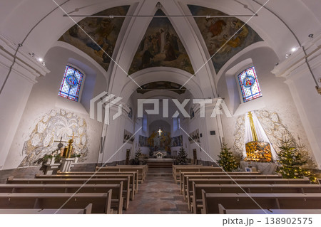 Zlin church interior featuring a vaulted ceiling and Christmas decor 138902575