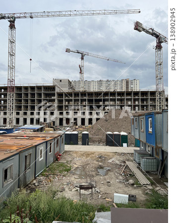Construction Site with Temporary Worker Trailers and Tower Crane Construction Site with Temporary Worker Trailers and Tower Crane 138902945