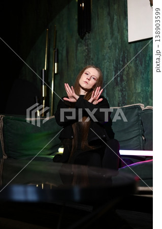 Presenter interacts with audience using expressive gestures Presenter interacts with audience using expressive gestures 138903599