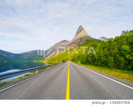 Scenic road view of Mount Stetinden in Norway. Scenic road view of Mount Stetinden in Norway. 138903768