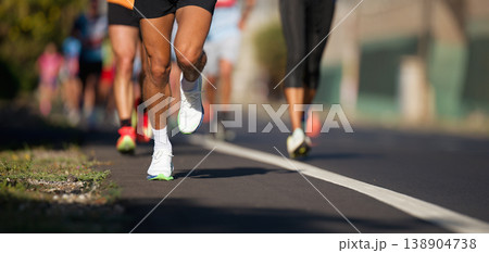 Marathon running race, people feet on city road, runners run urban marathon in the the city 138904738
