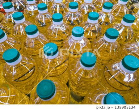 Bottles of cooking oil in supermarket aisle during daytime 138905134