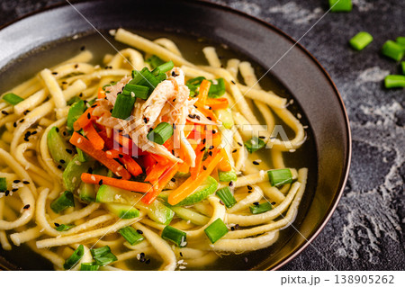 Traditional Korean chicken soup with homemade noodles 138905262
