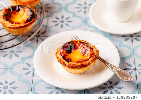 Egg tart, traditional Portuguese dessert, pastel. Egg tart, traditional Portuguese dessert, pastel. 138905287