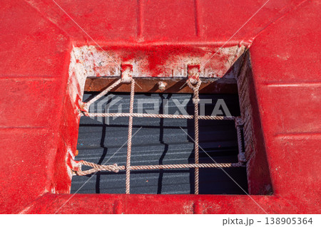 Liferaft container detail with rope grid opening on ferry deck Liferaft container detail with rope grid opening on ferry deck 138905364