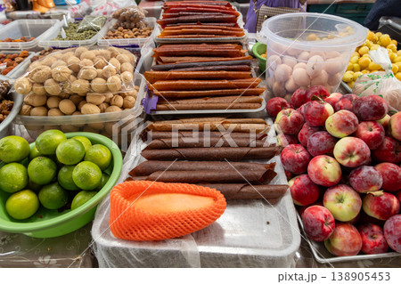 Colorful dried fruit rolls at outdoor market in Kyrgyzstan Colorful dried fruit rolls at outdoor market in Kyrgyzstan 138905453
