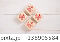 Target and Goal Setting Concept , Red Target Icons on Wooden Blocks 138905584