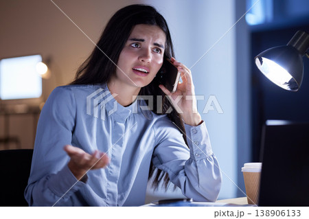 Phone call, question and angry business woman talking, chatting or speaking to contact in office at night. Technology, questions and upset or confused female with mobile for networking or discussion. Phone call, question and angry business woman talking, chatting or speaking to contact in office at night. Technology, questions and upset or confused female with mobile for networking or discussion. 138906133