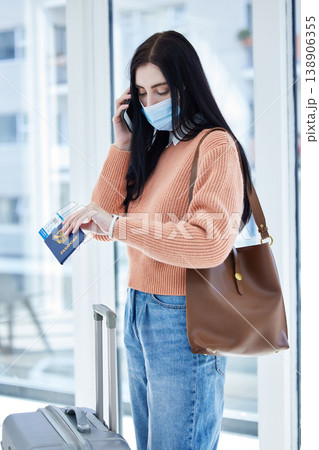 Covid, travel and passport with woman in face mask and phone call for immigration law, corona virus airport policy. Person with suitcase check time on watch with document problem, covid 19 compliance Covid, travel and passport with woman in face mask and phone call for immigration law, corona virus airport policy. Person with suitcase check time on watch with document problem, covid 19 compliance 138906355