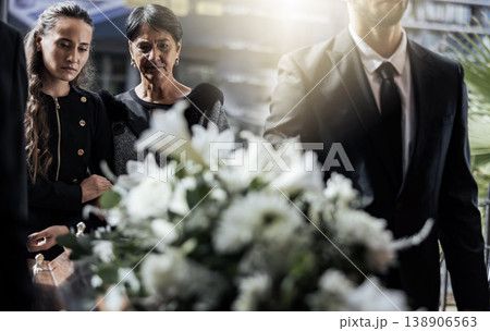 Funeral, coffin and family or friends at death, mourning and church burial event sad together. Depression, grief and christian religion gathering of people and women with support with flowers Funeral, coffin and family or friends at death, mourning and church burial event sad together. Depression, grief and christian religion gathering of people and women with support with flowers 138906563
