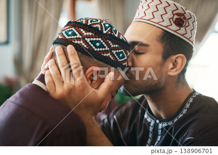 Kiss, muslim and father with son in house for bonding, ramadan kareem and love. Support, Islamic celebration and religion with man and child in living room of family home for culture and care Kiss, muslim and father with son in house for bonding, ramadan kareem and love. Support, Islamic celebration and religion with man and child in living room of family home for culture and care 138906701