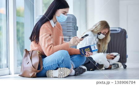 Passport, covid and mask, travel with smartphone for communication after canceled flight. Woman, compliance of health and safety rules, vaccination and traveling restriction during pandemic. 138906784
