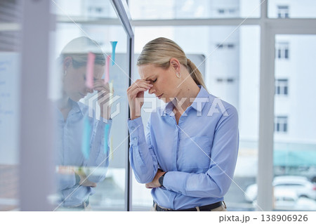 Sad, burnout and worried business woman with a work stress headache at an office. Corporate finance manager working overtime with anxiety about an accounting audit, financial tax and job project Sad, burnout and worried business woman with a work stress headache at an office. Corporate finance manager working overtime with anxiety about an accounting audit, financial tax and job project 138906926