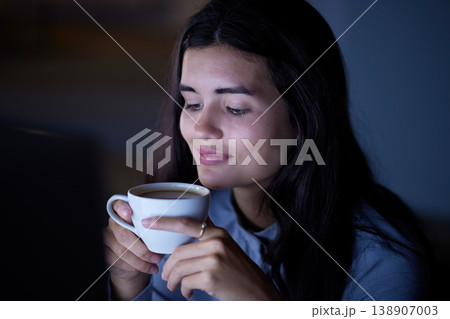 Night, coffee and business woman in office for planning, overtime and designer deadline. Happy, smile and tea with employee workaholic for networking, innovation and development in corporate company 138907003