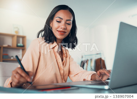 Graphic designer, freelance artist and digital retoucher working on laptop and drawing tablet in creative studio. Trendy woman doing edit, retouch and sketch of picture, plan and design online 138907004
