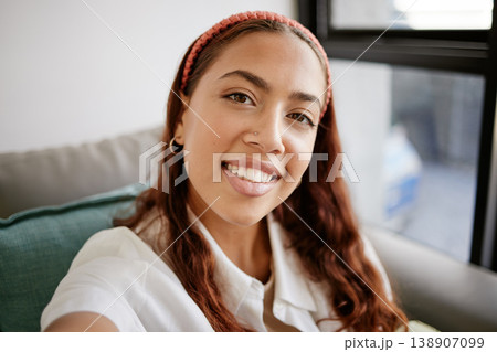 Relax, home and selfie of latina woman on the sofa enjoying free time, holiday and weekend. Beauty, smile and face portrait of young female in city apartment chilling, relaxing and happy on vacation Relax, home and selfie of latina woman on the sofa enjoying free time, holiday and weekend. Beauty, smile and face portrait of young female in city apartment chilling, relaxing and happy on vacation 138907099