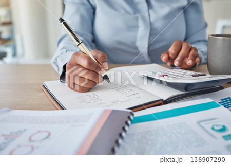 Accounting, bank payment and payroll with a finance manager, accountant or business woman using a calculator in her office. Debt, tax and writing in a notebook for banking with a female accountant 138907290
