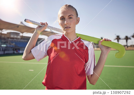 Hockey, woman and sports athlete portrait on field for training or competition match outdoors. Healthy sport person, exercise motivation lifestyle and fitness coach or hockey player on stadium ground Hockey, woman and sports athlete portrait on field for training or competition match outdoors. Healthy sport person, exercise motivation lifestyle and fitness coach or hockey player on stadium ground 138907292